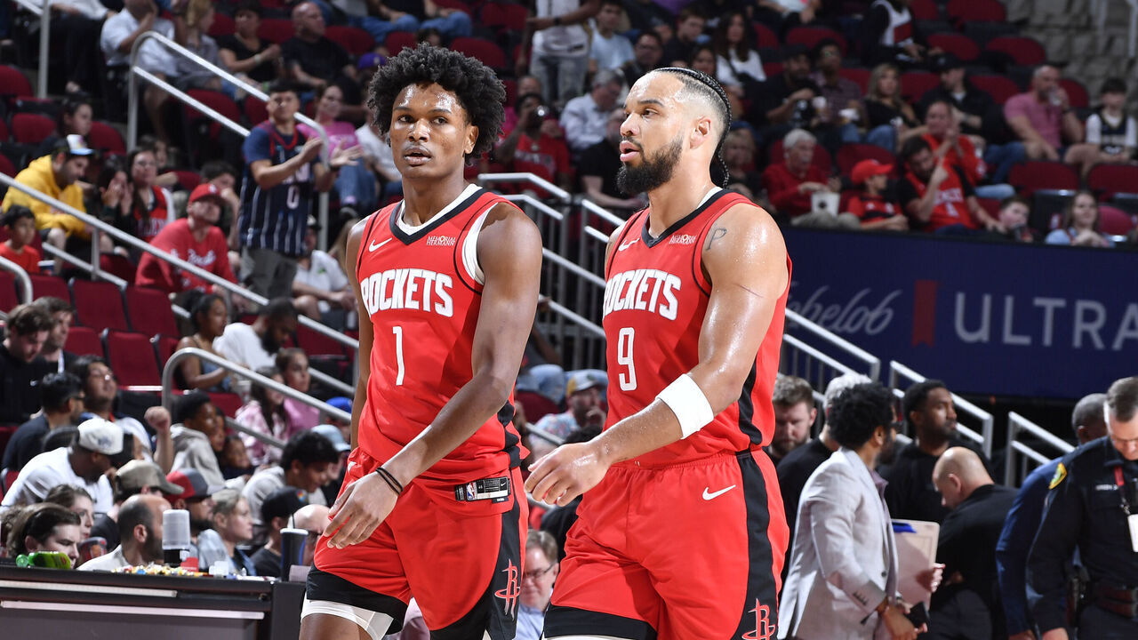 HOUSTON, TX - MARCH 8: Amen Thompson #1 and Dillon Brooks #9 of the Houston Rockets during the game against the New Orleans Pelicans on March 8, 2025 at the Toyota Center in Houston, Texas. Mandatory Copyright Notice: Copyright 2025 NBAE
