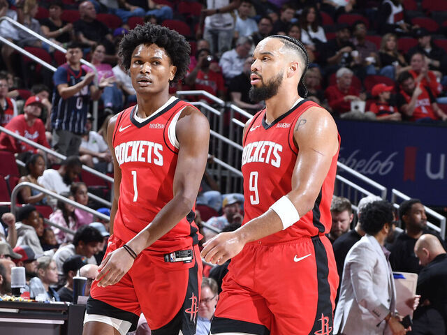 HOUSTON, TX - MARCH 8: Amen Thompson #1 and Dillon Brooks #9 of the Houston Rockets during the game against the New Orleans Pelicans on March 8, 2025 at the Toyota Center in Houston, Texas. Mandatory Copyright Notice: Copyright 2025 NBAE