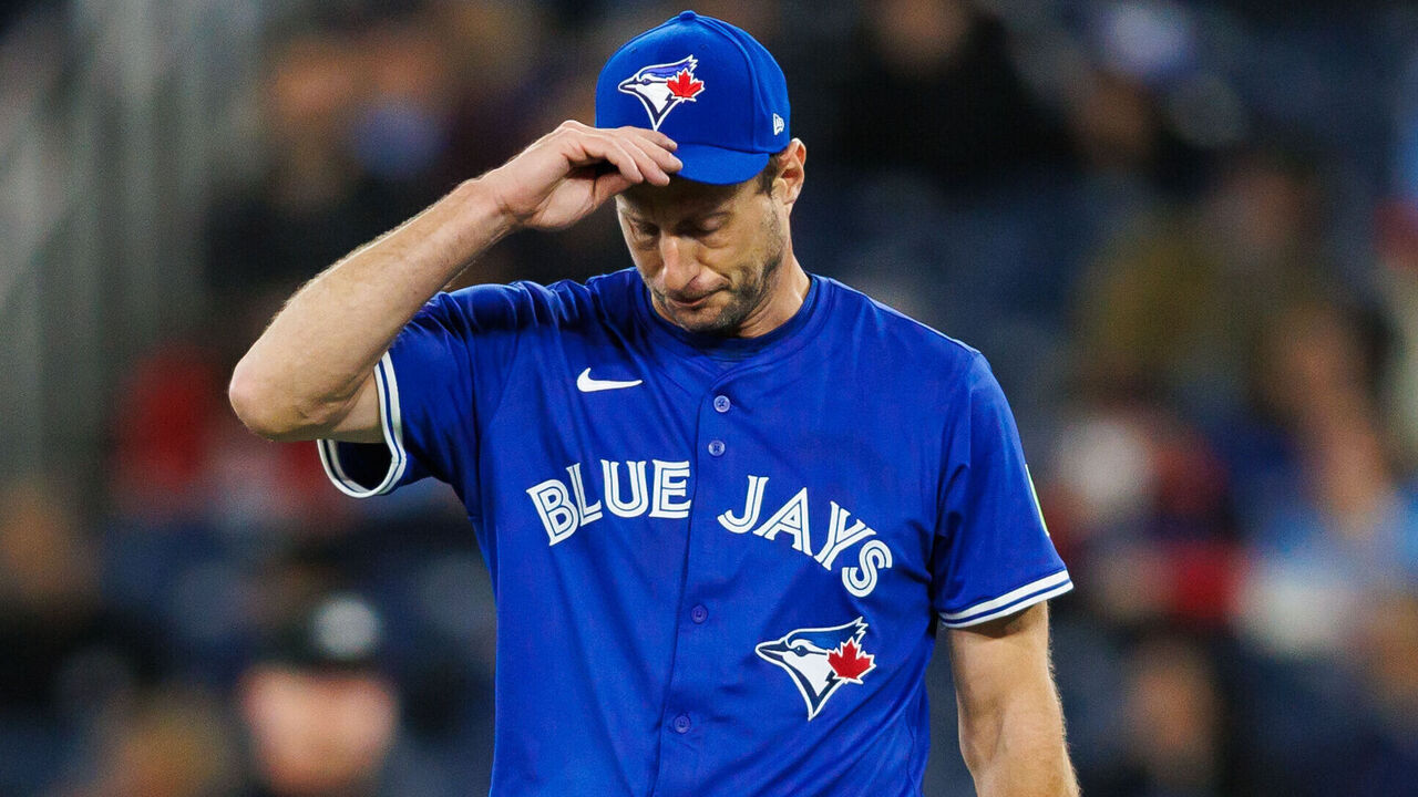 TORONTO, CANADA - MARCH 29: Max Scherzer #31 of the Toronto Blue Jays reacts on the mound as he pitches in the first inning of their MLB game against the Baltimore Orioles at Rogers Centre on March 29, 2025 in Toronto, Ontario, Canada.