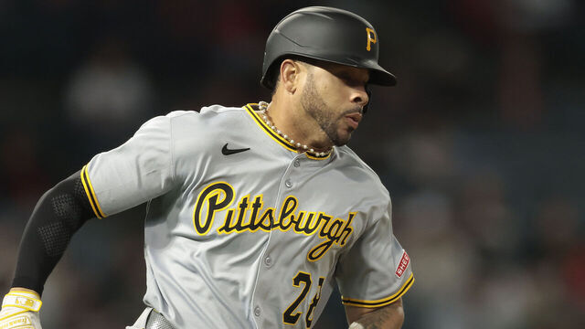 ANAHEIM, CALIFORNIA - APRIL 23: Tommy Pham #28 of the Pittsburgh Pirates hits a rbi single against the Los Angeles Angels in the ninth inning at Angel Stadium of Anaheim on April 23, 2025 in Anaheim, California.