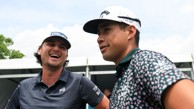 AVONDALE, LOUISIANA - APRIL 24: Kevin Velo of the United States and Isaiah Salinda of the United States speak to a reporter after their round on day one of the Zurich Classic of New Orleans on April 24, 2025 in Avondale, Louisiana.