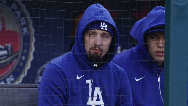 WASHINGTON, DC - APRIL 8: Blake Snell (L) #7 of the Los Angeles Dodgers and Roki Sasaki #11 sit in the dugout in the second inning during a game against the Washington Nationals at Nationals Park on April 8, 2025 in Washington, DC.