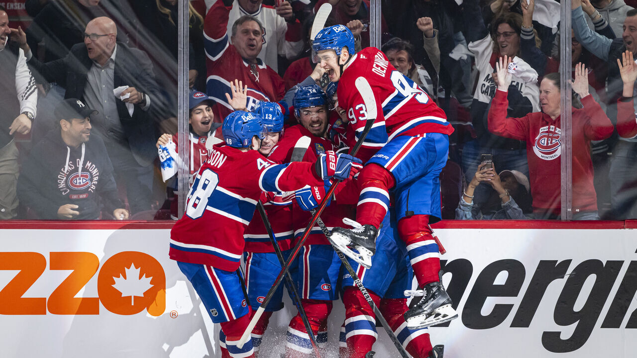 MONTREAL, CANADA- APRIL 25: Nick Suzuki #14 of the Montreal Canadiens celebrates after scoring a goal during the second period of the Game Three of the First Round of the 2025 NHL Stanley Cup Playoffs between the Montreal Canadiens and the Washington Capitals at the Bell Centre on April 25, 2025 in Montreal, Quebec, Canada.