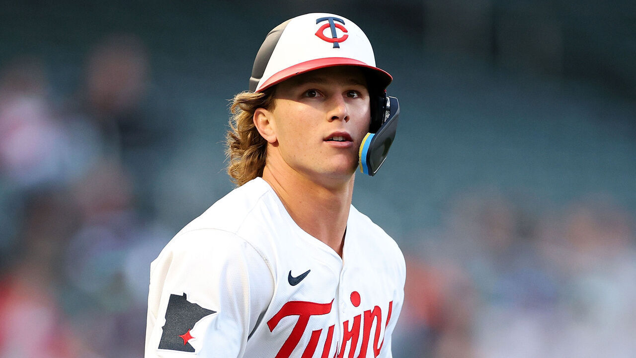 MINNEAPOLIS, MINNESOTA - APRIL 23: Luke Keaschall #15 of the Minnesota Twins advances to first base after drawing a walk against the Chicago White Sox in the third inning at Target Field on April 23, 2025 in Minneapolis, Minnesota. The Twins defeated the White Sox 6-3.