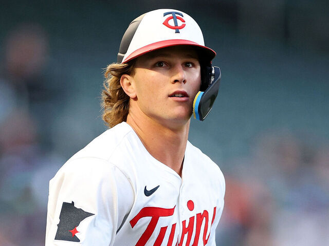 MINNEAPOLIS, MINNESOTA - APRIL 23: Luke Keaschall #15 of the Minnesota Twins advances to first base after drawing a walk against the Chicago White Sox in the third inning at Target Field on April 23, 2025 in Minneapolis, Minnesota. The Twins defeated the White Sox 6-3.