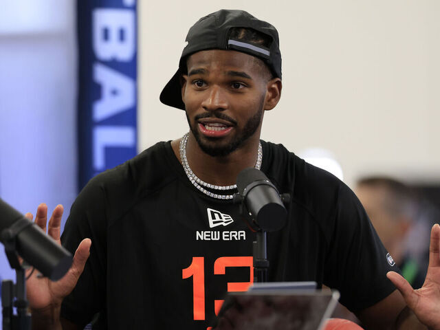 INDIANAPOLIS, INDIANA - FEBRUARY 28: Shedeur Sanders #QB13 of Colorado speaks to the media during the NFL Combine at Lucas Oil Stadium on February 28, 2025 in Indianapolis, Indiana.