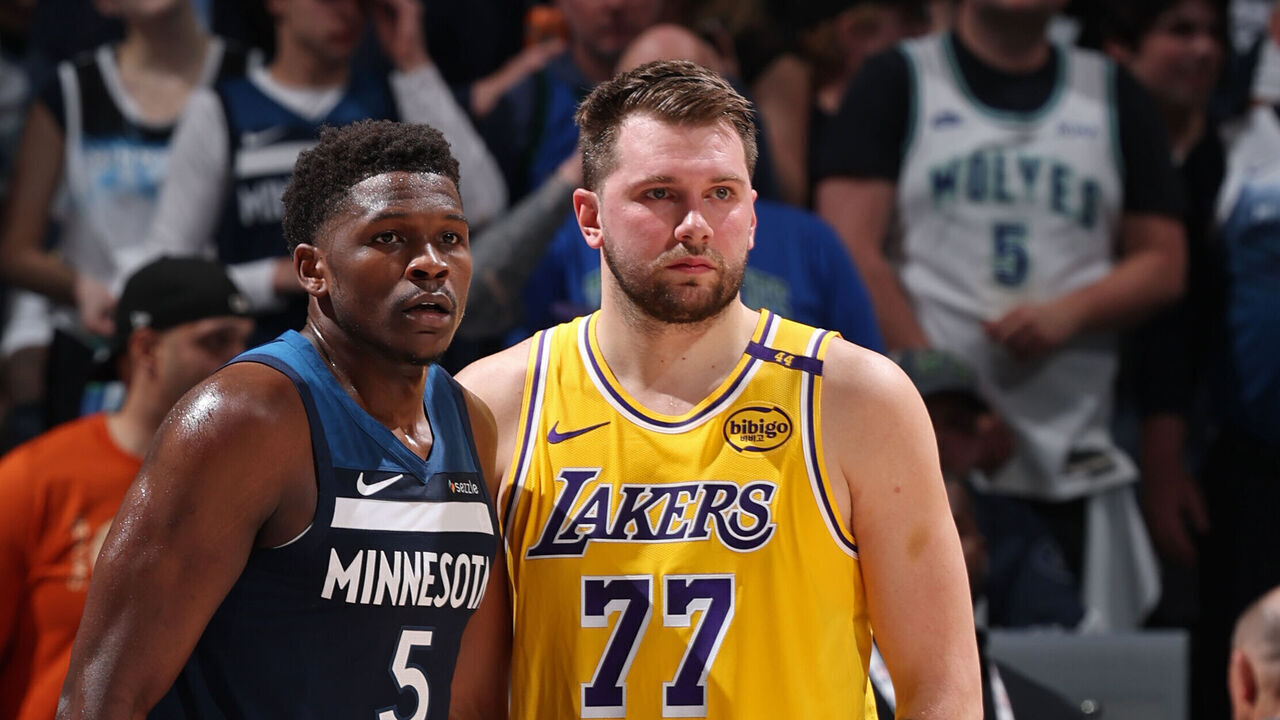 MINNEAPOLIS, MN - APRIL 25: Anthony Edwards #5 of the Minnesota Timberwolves and Luka Doncic #77 of the Los Angeles Lakers look on during the game during Round 1 Game 3 of the 2025 NBA Playoffs on April 25, 2025 at Target Center in Minneapolis, Minnesota. Mandatory Copyright Notice: Copyright 2025 NBAE