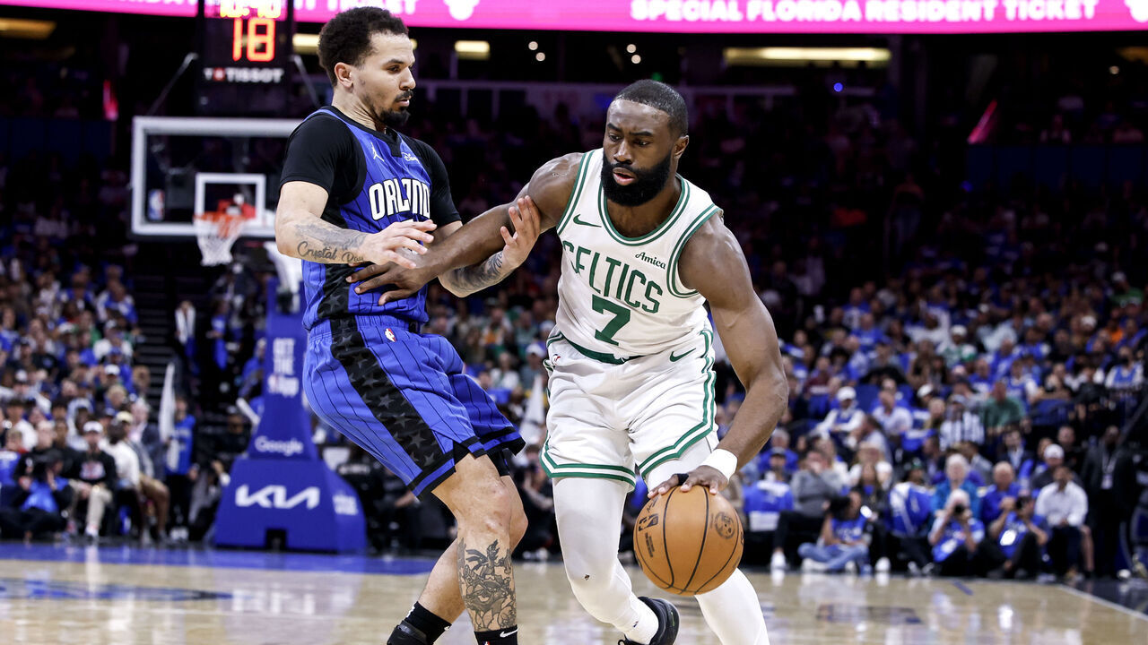 ORLANDO, FL - APRIL 25: Jaylen Brown #7 of the Boston Celtics is defended by Cole Anthony #50 of the Orlando Magic during the first half in Game 3 of the first round of the 2025 NBA Playoffs at the Kia Center on April 25, 2025 in Orlando, Florida. The Magic defeated the Celtics 95 to 93.