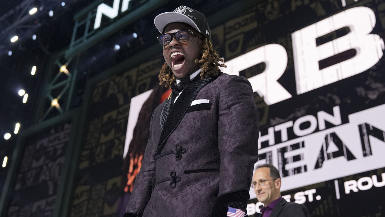 GREEN BAY, WISCONSIN - APRIL 24: Boise State running back Ashton Jeanty celebrates after being selected sixth overall by the Las Vegas Raiders during the first round of the 2025 NFL Draft on April 24, 2025 in Green Bay, Wisconsin.