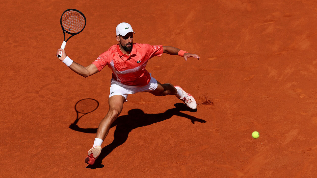 MADRID, SPAIN - APRIL 26: Novak Djokovic of Serbia plays a forehand against Matteo Arnaldi of Italy in the Men's Singles Second Round match during Day Five of the Mutua Madrid Open at La Caja Magica on April 26, 2025 in Madrid, Spain.