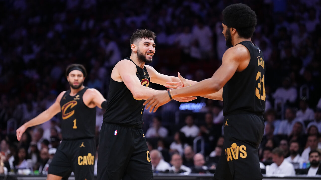 MIAMI, FLORIDA - APRIL 26: Jarrett Allen #31 celebrates with Ty Jerome #2 of the Cleveland Cavaliers after scoring against the Miami Heat during the second quarter in Game Three of the Eastern Conference First Round NBA Playoffs at Kaseya Center on April 26, 2025 in Miami, Florida.