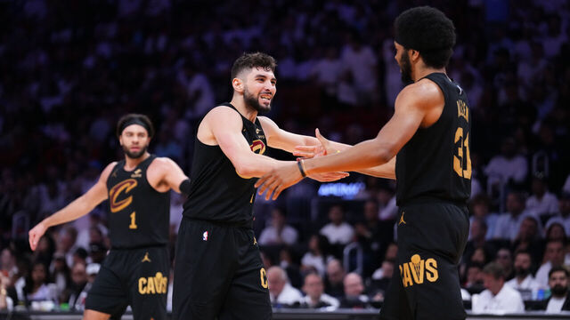 MIAMI, FLORIDA - APRIL 26: Jarrett Allen #31 celebrates with Ty Jerome #2 of the Cleveland Cavaliers after scoring against the Miami Heat during the second quarter in Game Three of the Eastern Conference First Round NBA Playoffs at Kaseya Center on April 26, 2025 in Miami, Florida.