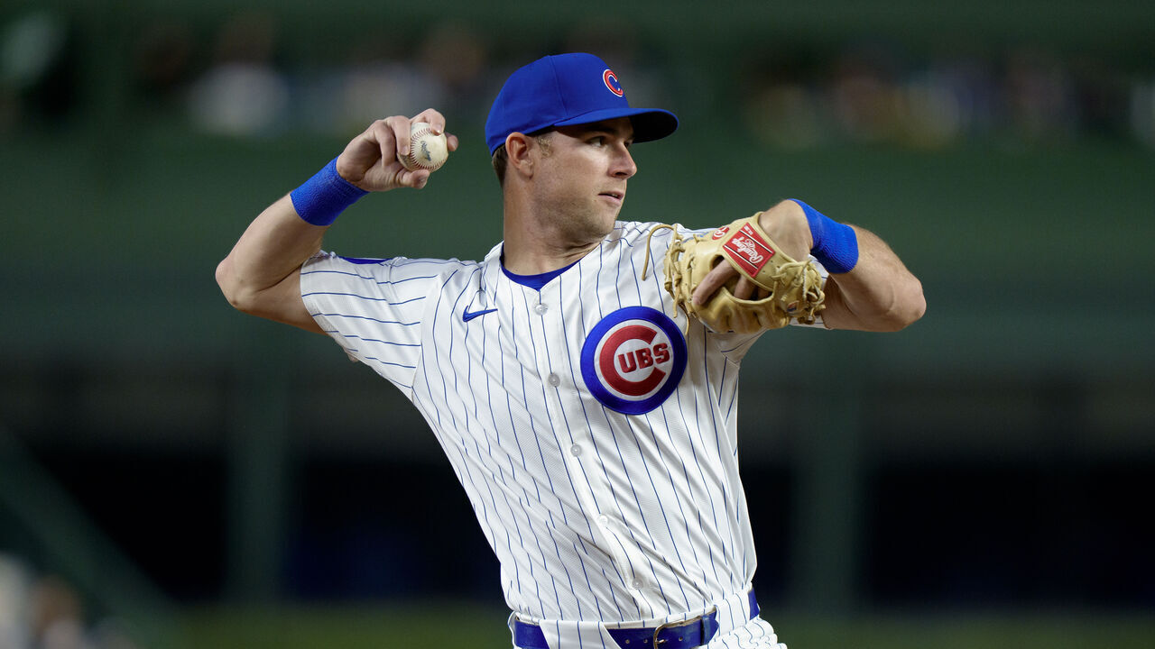 CHICAGO, ILLINOIS - APRIL 22: Gage Workman #25 of the Chicago Cubs plays third base in a game against the Los Angeles Dodgers at Wrigley Field on April 22, 2025 in Chicago, Illinois.