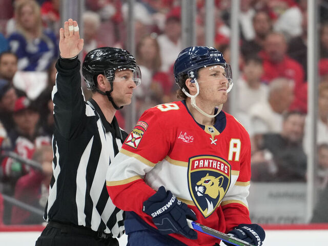 SUNRISE, FL - APRIL 26: Florida Panthers left wing Matthew Tkachuk (19) is escorted to the team bench in the first period during the Stanley Cup Playoffs First Round game between the Tampa Bay Lightning and the Florida Panthers on Saturday, April 26, 2025 at Amerant Bank Arena in Sunrise, FL.