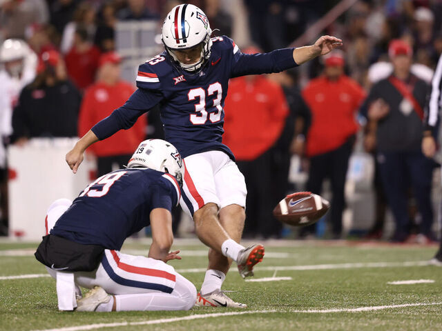 TUCSON, ARIZONA - NOVEMBER 15: Place kicker Tyler Loop #33 of the Arizona Wildcats kicks a field goal during the game against the Houston Cougars at Arizona Stadium on November 15, 2024 in Tucson, Arizona. The Wildcats defeated the Cougars 27-3.