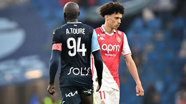 Le Havre's Guinean midfielder #94 Abdoulaye Toure (L) shakes hands with Monaco's French midfielder #11 Maghnes Akliouche at the end of the French L1 football match between Le Havre AC and AS Monaco at the Stade Oceane in Le Havre, north-western France, on April 26, 2025.