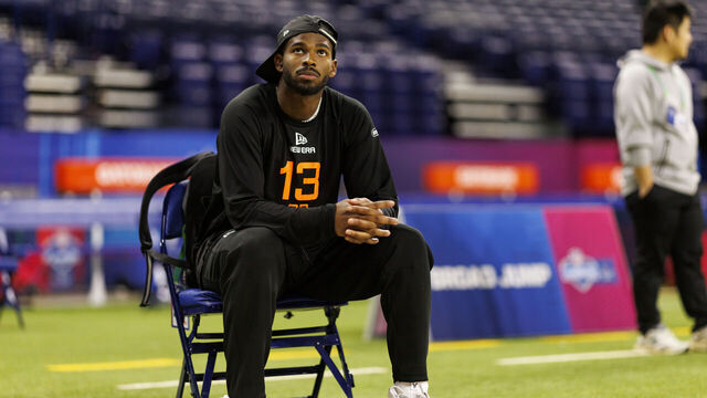 INDIANAPOLIS, INDIANA - MARCH 1: Shedeur Sanders #QB13 of Colorado sits on the field during the NFL Scouting Combine at Lucas Oil Stadium on March 1, 2025 in Indianapolis, Indiana.