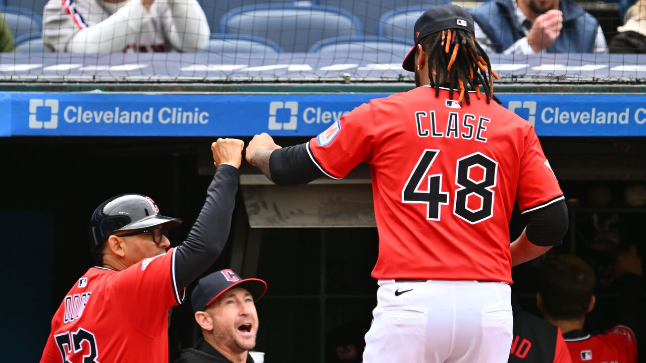 CLEVELAND, OHIO - APRIL 26: Rouglas Odor #53 and Craig Albernaz #55 celebrate with relief pitcher Emmanuel Clase #48 of the Cleveland Guardians after the eighth inning of game one of a doubleheader against the Boston Red Sox at Progressive Field on April 26, 2025 in Cleveland, Ohio. The Guardians defeated the Red Sox 5-4.