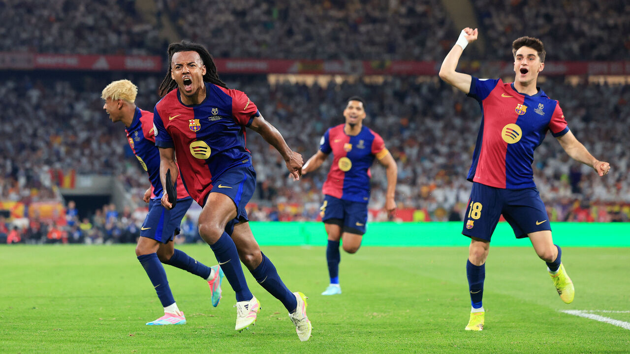 SEVILLE, SPAIN - APRIL 26: Jules Kounde of FC Barcelona scores his team's third goal during the Copa del Rey Final match between FC Barcelona and Real Madrid at Estadio de La Cartuja on April 26, 2025 in Seville, Spain.