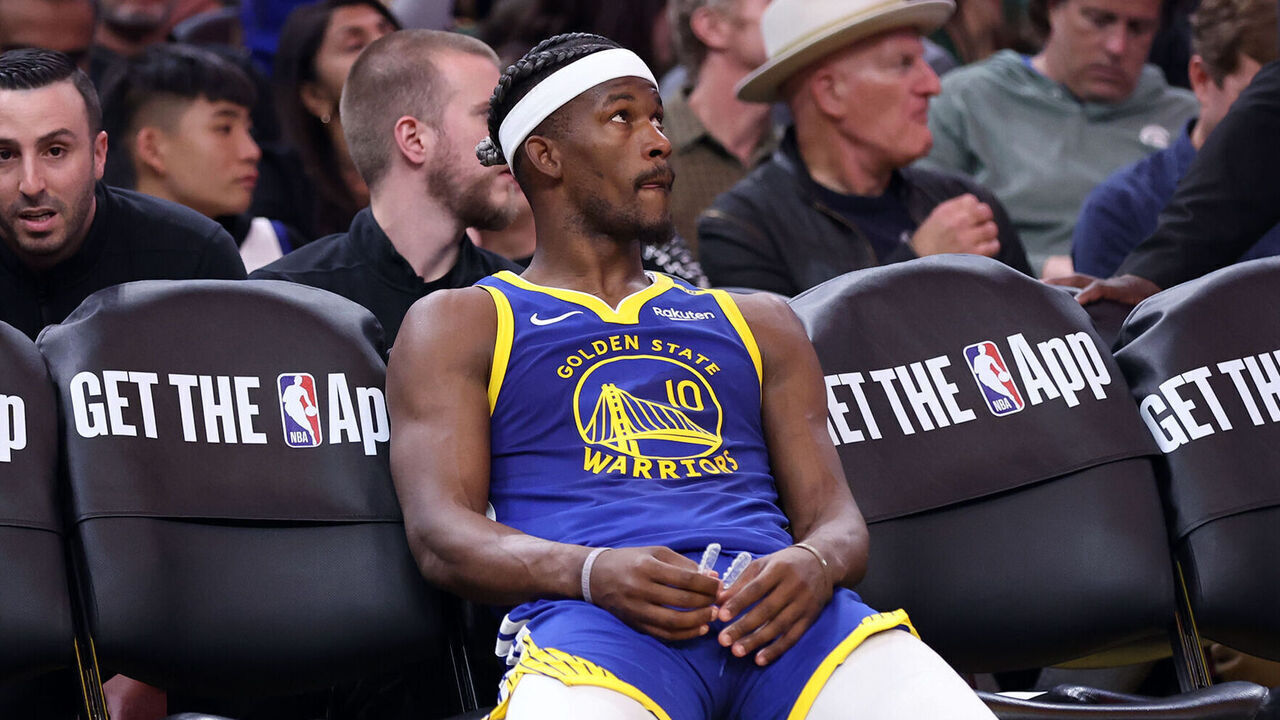 Golden State Warriors' Jimmy Butler III sits on bench during a video review in 4th quarter of Denver Nuggets' 114-105 win in NBA game at Chase Center in San Francisco on Monday, March 17, 2025.