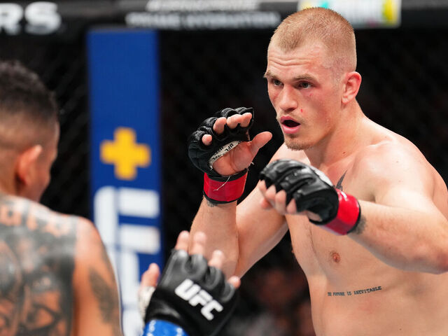 KANSAS CITY, MISSOURI - APRIL 26: (R-L) Ian Machado Garry of Ireland faces Carlos Prates of Brazil in a welterweight fight during the UFC Fight Night event at T-Mobile Center on April 26, 2025 in Kansas City, Missouri.