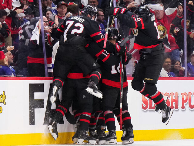 OTTAWA, CANADA - APRIL 26: Members of the Ottawa Senators celebrate an overtime goal by Jake Sanderson #85 against the Toronto Maple Leafs in Game Four of the First Round of the 2025 Stanley Cup Playoffs at Canadian Tire Centre on April 26, 2025 in Ottawa, Ontario, Canada.