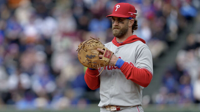 CHICAGO, ILLINOIS - APRIL 25: Bryce Harper #3 of the Philadelphia Phillies plays first base in a game against the Chicago Cubs at Wrigley Field on April 25, 2025 in Chicago, Illinois.