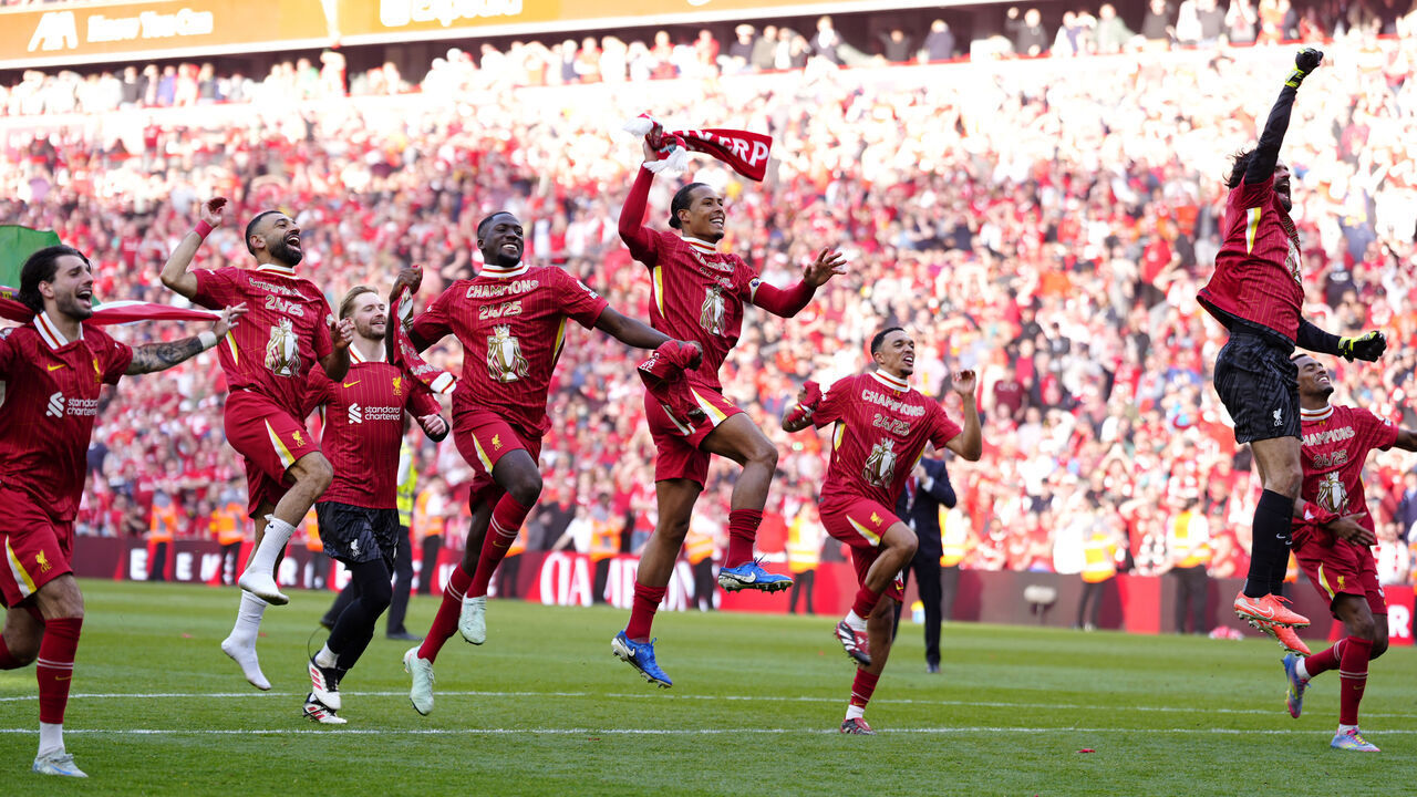 Liverpool players celebrate victory and the Premier League title following the Premier League match at Anfield, Liverpool. Picture date: Sunday April 27, 2025.