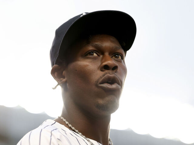 NEW YORK, NEW YORK - APRIL 25: Jazz Chisholm Jr. #13 of the New York Yankees stands by the dugout after the top of the first inning against the Toronto Blue Jays at Yankee Stadium on April 25, 2025 in the Bronx borough of New York City.
