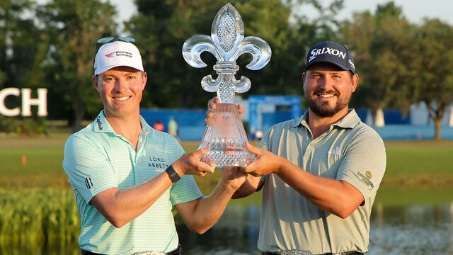 AVONDALE, LOUISIANA - APRIL 27: Ben Griffin of the United States and Andrew Novak of the United States pose for a photo with the trophy on day four of the Zurich Classic of New Orleans on April 27, 2025 in Avondale, Louisiana.