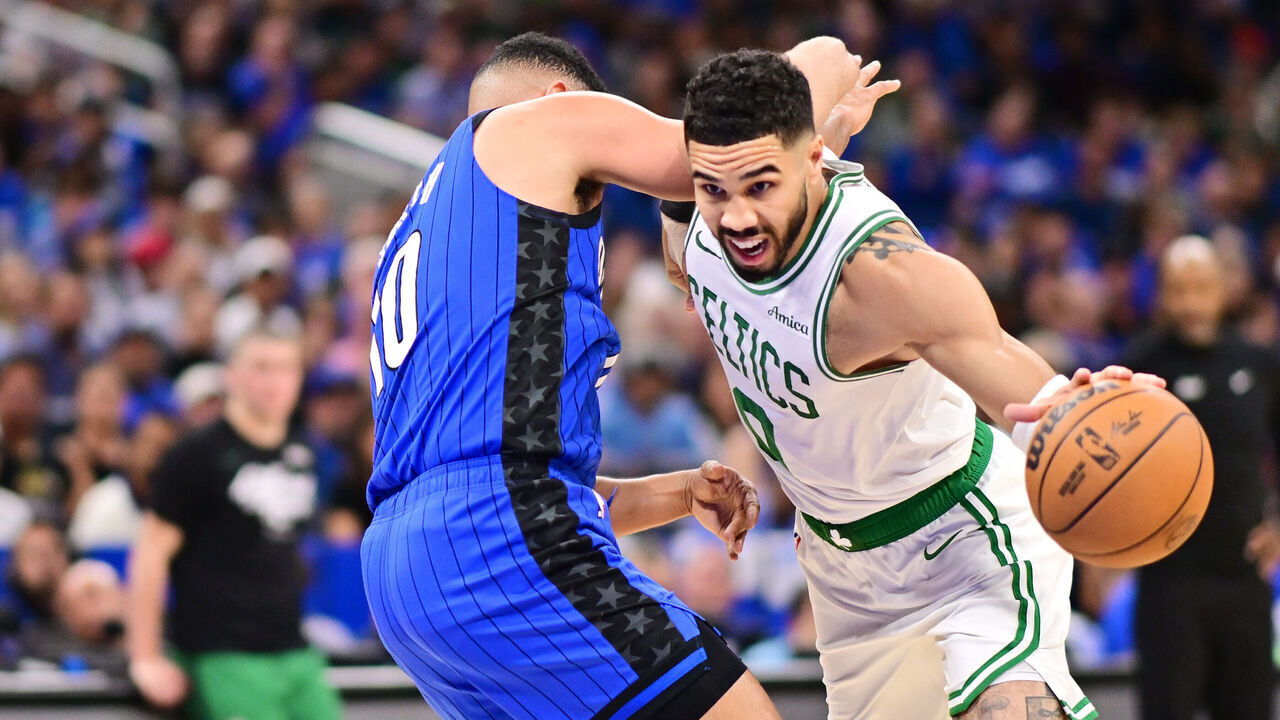 ORLANDO, FLORIDA - APRIL 27: Jayson Tatum #0 of the Boston Celtics drives to the basket against Cory Joseph #10 of the Orlando Magic in the first half of game 4 of the first round of the 2025 NBA Playoffs at Kia Center on April 27, 2025 in Orlando, Florida.