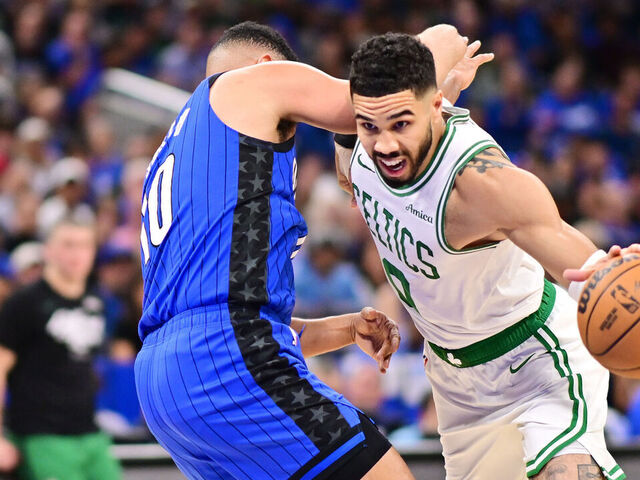 ORLANDO, FLORIDA - APRIL 27: Jayson Tatum #0 of the Boston Celtics drives to the basket against Cory Joseph #10 of the Orlando Magic in the first half of game 4 of the first round of the 2025 NBA Playoffs at Kia Center on April 27, 2025 in Orlando, Florida.