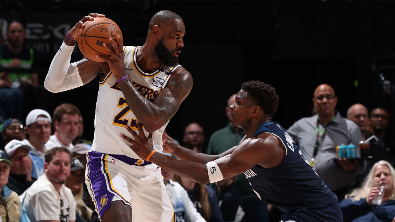 MINNEAPOLIS, MN - APRIL 27: LeBron James #23 of the Los Angeles Lakers handles the ball during the game against Anthony Edwards #5 of the Minnesota Timberwolves during Round 1 Game 4 of the 2025 NBA Playoffs on April 27, 2025 at Target Center in Minneapolis, Minnesota. Mandatory Copyright Notice: Copyright 2025 NBAE