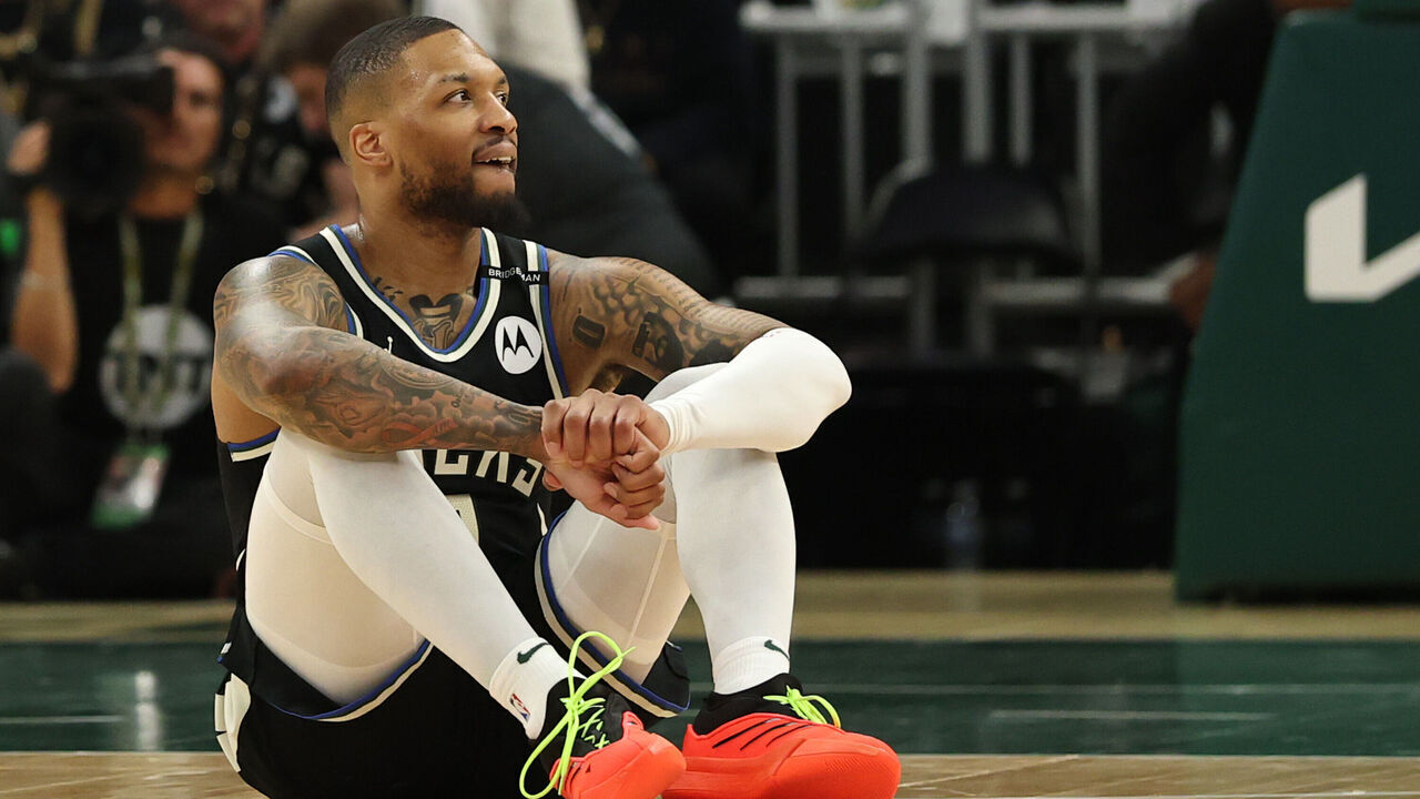 MILWAUKEE, WISCONSIN - APRIL 27: Damian Lillard #0 of the Milwaukee Bucks reacts from the court after an apparent injury during the first quarter in Game Four of the Eastern Conference First Round NBA Playoffs against the Indiana Pacers at Fiserv Forum on April 27, 2025 in Milwaukee, Wisconsin.