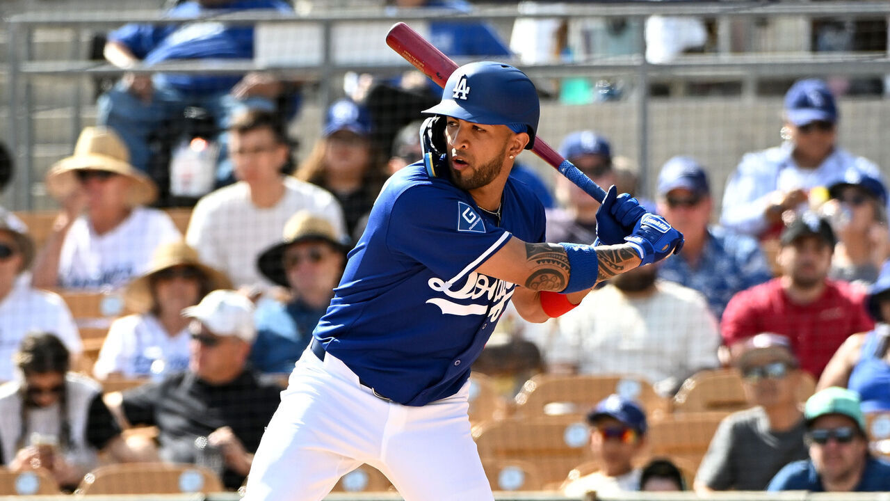 GLENDALE, ARIZONA - MARCH 02, 2025: Eddie Rosario #9 of the Los Angeles Dodgers bats during the fifth inning of a spring training game against the Chicago White Sox at Camelback Ranch on March 02, 2025 in Glendale, Arizona.