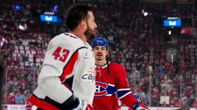 MONTREAL, QUEBEC - APRIL 25: Arber Xhekaj #72 of the Montreal Canadiens and Tom Wilson #43 of the Washington Capitals exchange words before Game Three of the First Round of the 2025 Stanley Cup Playoffs at Bell Centre on April 25, 2025 in Montreal, Quebec.