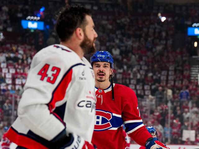 MONTREAL, QUEBEC - APRIL 25: Arber Xhekaj #72 of the Montreal Canadiens and Tom Wilson #43 of the Washington Capitals exchange words before Game Three of the First Round of the 2025 Stanley Cup Playoffs at Bell Centre on April 25, 2025 in Montreal, Quebec.