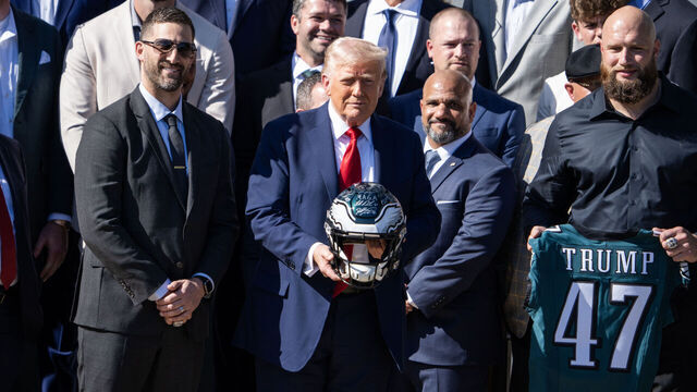 UNITED STATES - APRIL 28: President Donald Trump poses with offensive tackle Lane Johnson, right, and head coach Nick Sirianni, left, during a ceremony with the Philadelphia Eagles, winners of the 2025 Super Bowl, on the South Lawn of the White House on Monday, April 28, 2025. (Tom Williams/CQ-Roll Call, Inc via Getty Images)
