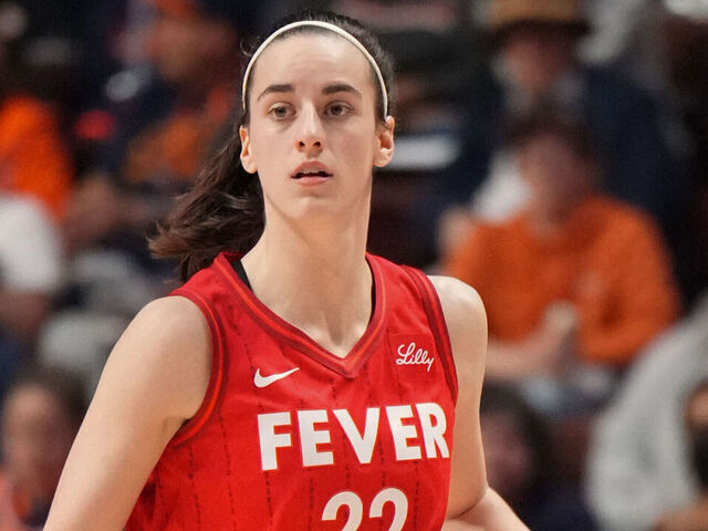 UNCASVILLE, CT - SEPTEMBER 25: Caitlin Clark #22 of the Indiana Fever dribbles the ball during the game against the Connecticut Sun during Round one Game two of the 2024 WNBA Playoffs on September 25, 2024 at the Mohegan Sun Arena in Uncasville, Connecticut. Mandatory Copyright Notice: Copyright 2024 NBAE