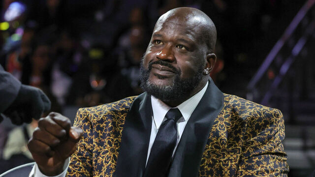 LAS VEGAS, NEVADA - DECEMBER 14: Naismith Memorial Basketball Hall of Fame member Shaquille O'Neal gets a fist bump as he attends a semifinal game of the Emirates NBA Cup at T-Mobile Arena between the Atlanta Hawks and the Milwaukee Bucks on December 14, 2024 in Las Vegas, Nevada. The Bucks defeated the Hawks 110-102.