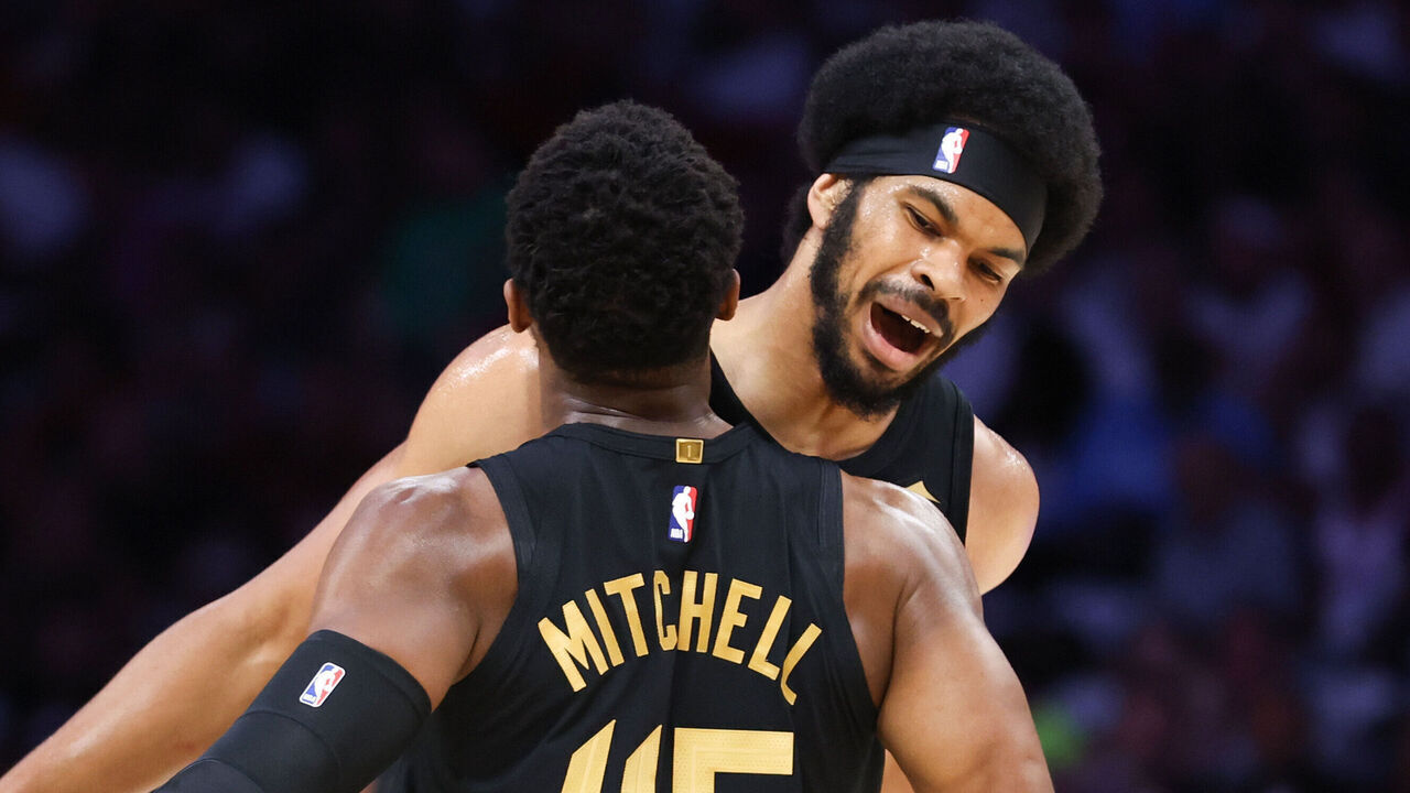 MIAMI, FLORIDA - APRIL 28: Donovan Mitchell #45 and Jarrett Allen #31 of the Cleveland Cavaliers celebrate during the first quarter in Game Four of the Eastern Conference First Round NBA Playoffs against the Miami Heat at Kaseya Center on April 28, 2025 in Miami, Florida.