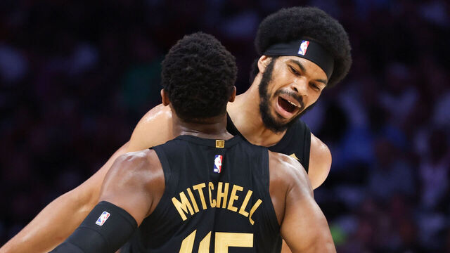 MIAMI, FLORIDA - APRIL 28: Donovan Mitchell #45 and Jarrett Allen #31 of the Cleveland Cavaliers celebrate during the first quarter in Game Four of the Eastern Conference First Round NBA Playoffs against the Miami Heat at Kaseya Center on April 28, 2025 in Miami, Florida.