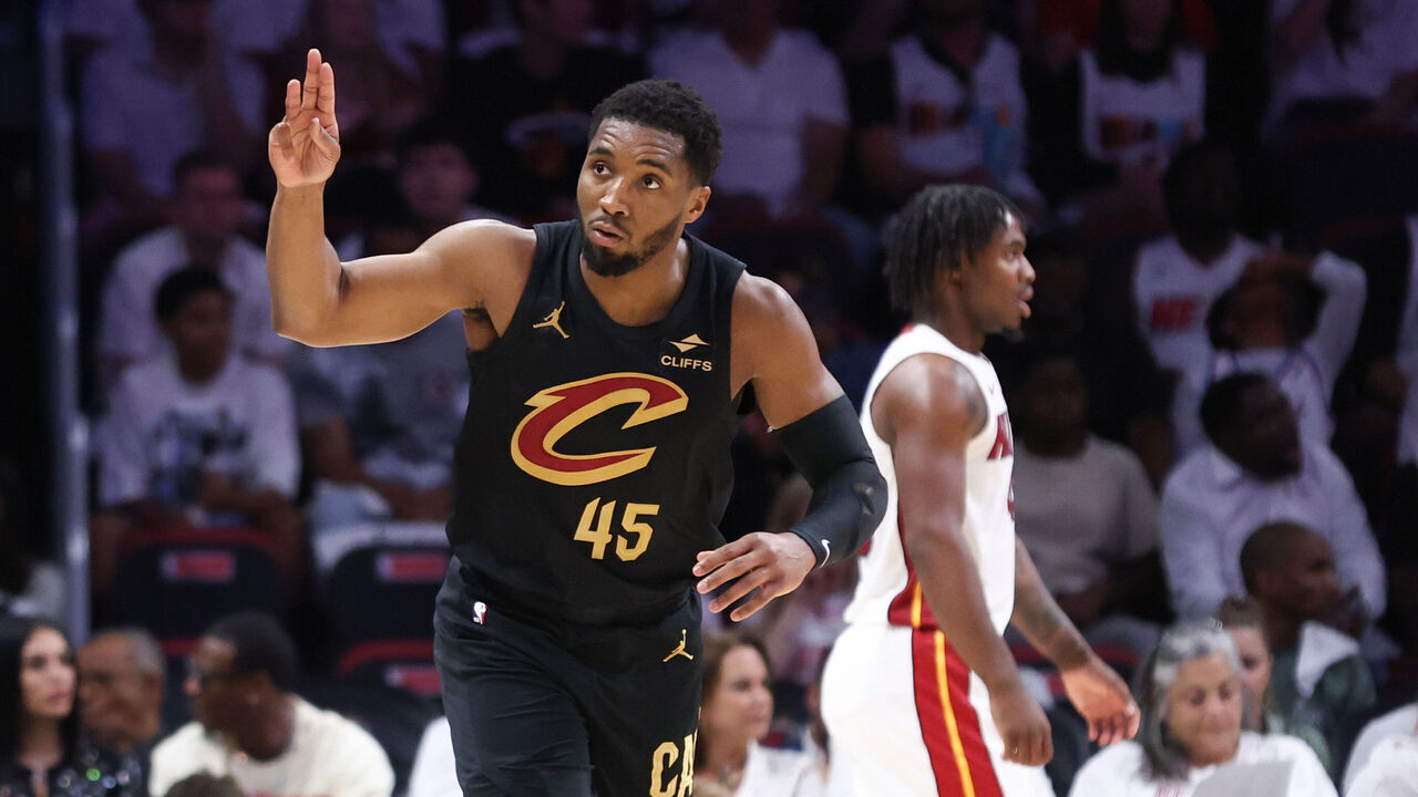 MIAMI, FLORIDA - APRIL 28: Donovan Mitchell #45 of the Cleveland Cavaliers reacts after making a basket against the Miami Heat during the third quarter in Game Four of the Eastern Conference First Round NBA Playoffs at Kaseya Center on April 28, 2025 in Miami, Florida.