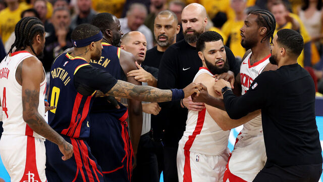 SAN FRANCISCO, CALIFORNIA - APRIL 28: Draymond Green #23 of the Golden State Warriors and Tari Eason #17 of the Houston Rockets fight during the second quarter in Game Four of the Western Conference First Round NBA Playoffs at Chase Center on April 28, 2025 in San Francisco, California.