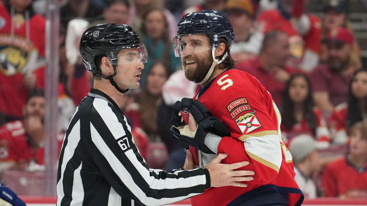SUNRISE, FL - APRIL 28: Florida Panthers defenseman Aaron Ekblad (5) gets talked to by an official after delivering a bit hit in the second period during the Stanley Cup Playoffs First Round game between the Tampa Bay Lightning and the Florida Panthers on Monday, April 28, 2025 at Amerant Bank Arena in Sunrise, FL