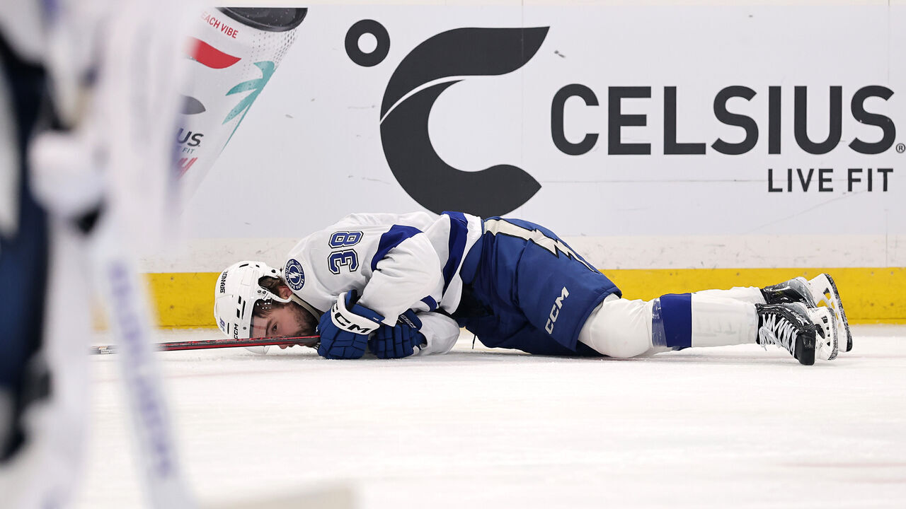 SUNRISE, FLORIDA - APRIL 28: Brandon Hagel #38 of the Tampa Bay Lightning is injured during the second period against the Florida Panthers in Game Four of the First Round of the 2025 Stanley Cup Playoffs at Amerant Bank Arena on April 28, 2025 in Sunrise, Florida.