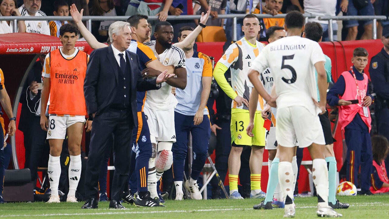 Antonio Rudiger of Real Madrid argues with the referee during the Final Copa del Rey match between Real Madrid and FC Barcelona at La Cartuja in Seville, Spain, on April 26, 2025.