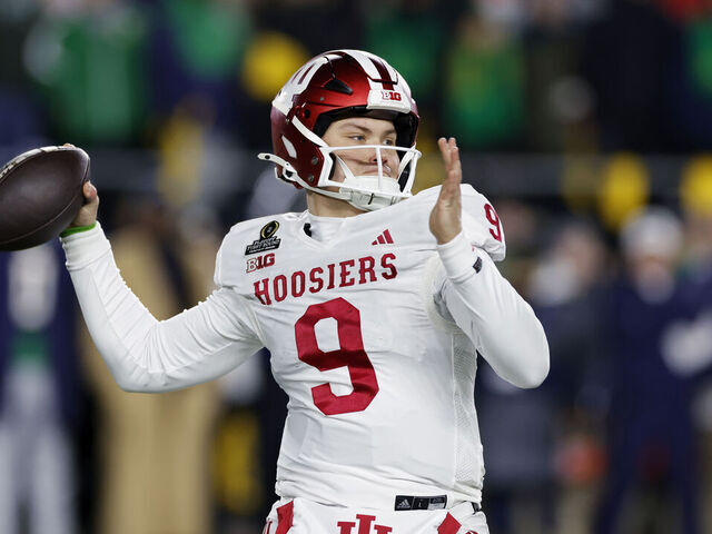 SOUTH BEND, IN - DECEMBER 20: Indiana Hoosiers quarterback Kurtis Rourke (9) passes the ball during the CFP First Round game against the Notre Dame Fighting Irish on December 20, 2024 at Notre Dame Stadium in South Bend, Indiana.