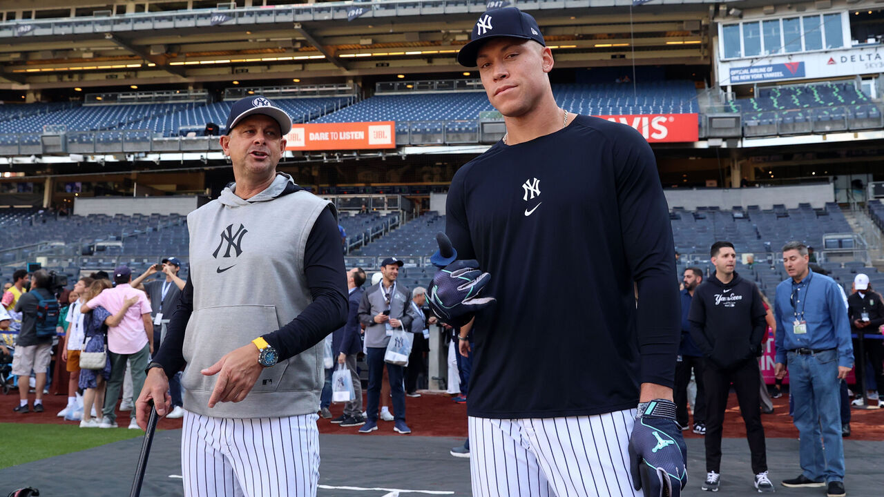 NEW YORK, NY - AUGUST 21: Manager, Aaron Boone #17 of the New York Yankees and Aaron Judge #99 talk before the game against the Cleveland Guardians at Yankee Stadium on August 21, 2024, in New York, New York.