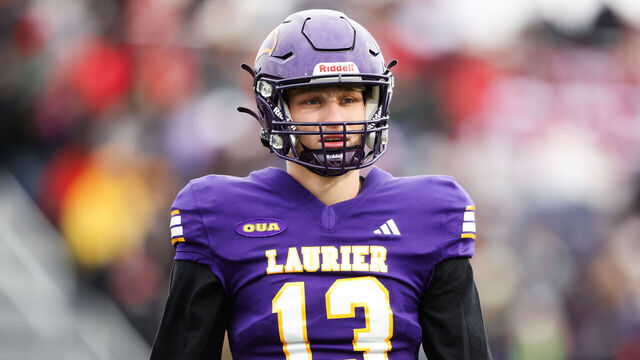 KINGSTON, CANADA - NOVEMBER 23: Taylor Elgersma #13 of Laurier Golden Hawks looks on during the second quarter against the Laval Rouge et Or during the 2024 Vanier Cup at Richardson Memorial Stadium on November 23, 2024 in Kingston, Ontario, Canada.